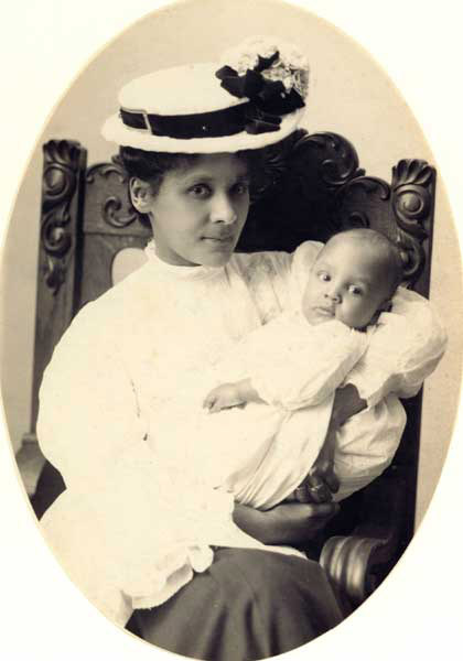 Fanny Taylor Dunham (mother) holding baby, Albert Jr. (brother), ca. 1910. Missouri Historical Society Photographs and Prints Collection.