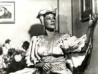 Katherine Dunham in Acaraje costume in Sarah Bernhardt's dressing room, Paris, 1959.