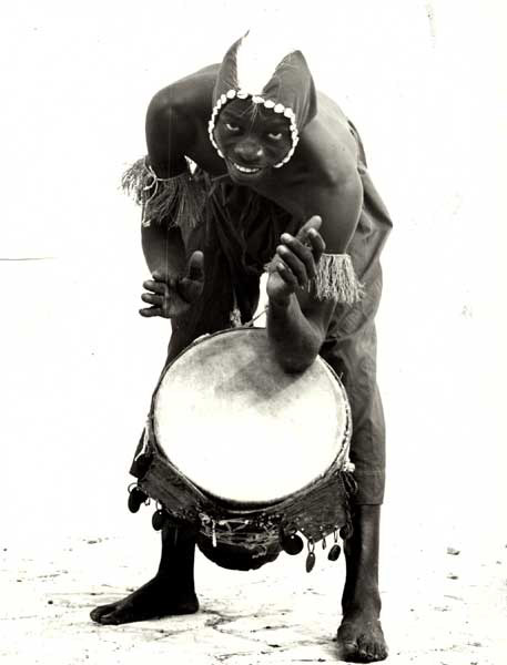 Mor Thiam at the 1966 Festival of Arts in Senegal, performing "Tambourinaire Sénégalais." 