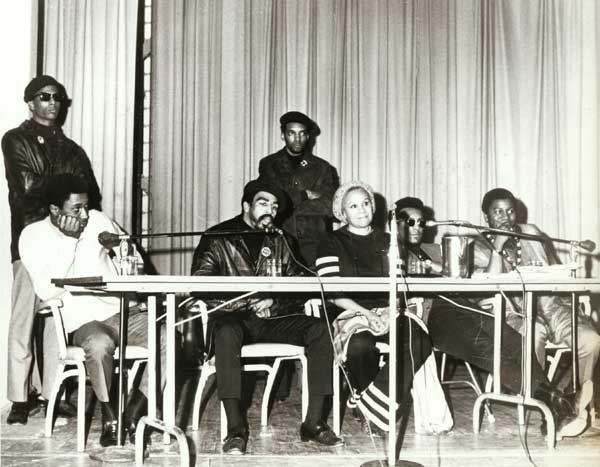 Katherine Dunham and Eugene Redmond with Rev. Charles Koen and other members of the Black Egyptians, 1968–1969.