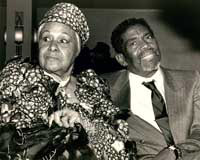 Katherine Dunham sitting with former student Alvin Ailey, ca. 1986. 