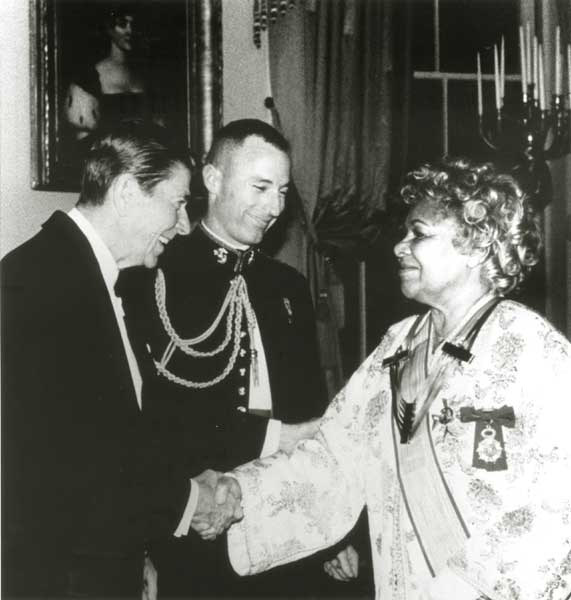 Katherine Dunham shaking hands with President Ronald Reagan during the Kennedy Center Honors, 1983.